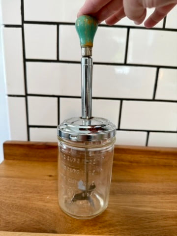 Glass Jar Nut Herb Chopper With A Turquoise Wooden Knob
