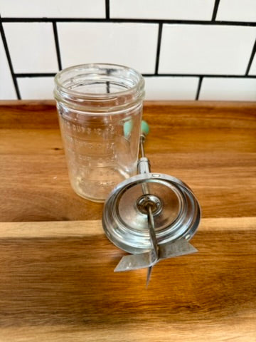 Glass Jar Nut Herb Chopper With A Turquoise Wooden Knob
